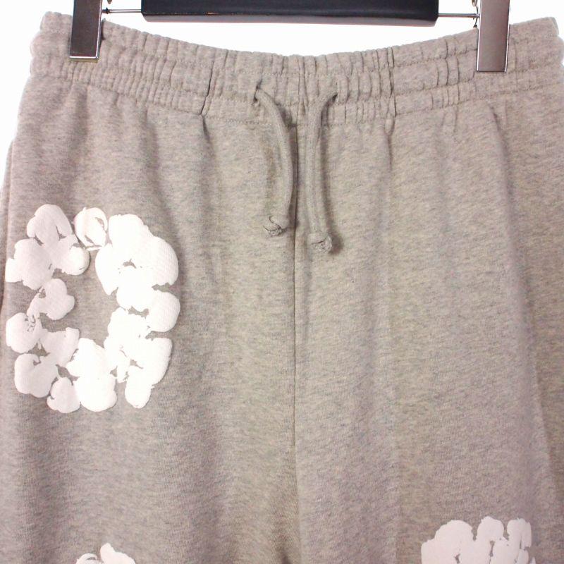 デニムティアーズ DENIM TEARS コットンリースバギースウェットパンツ