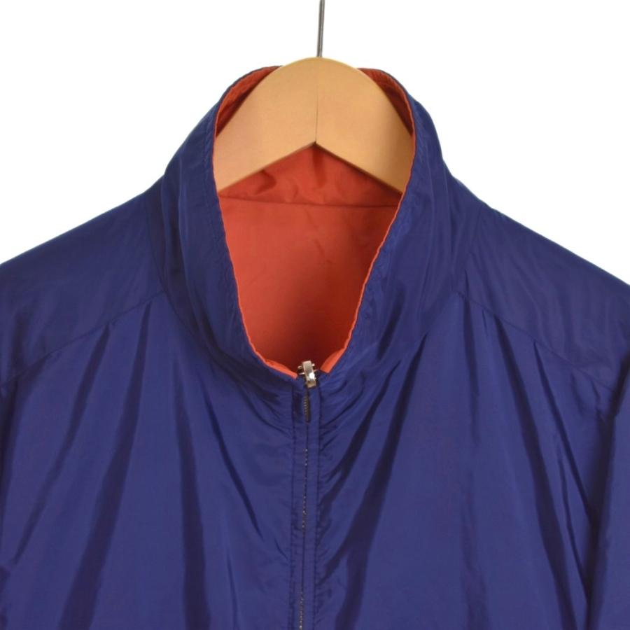 大幅値下げ中！PRADAプラダ　三角プレートリバーシブルナイロンジャケット 現行】PRADA ナイロンジャケット リバーシブル ネイビー 三角プレート