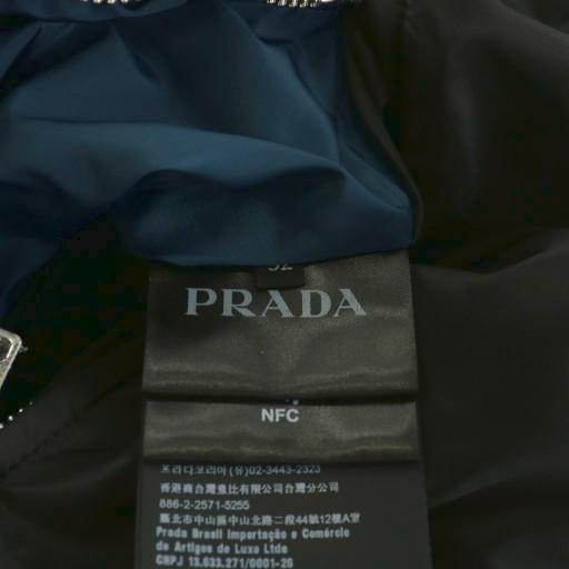 PRADA（プラダ） PRADA 23AW トライアングルプレート 三角ロゴ