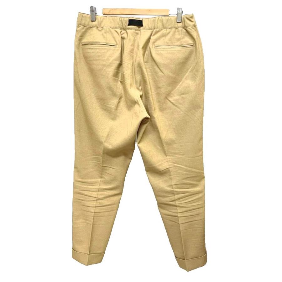 デサント DESCENTE テーパードパンツ スラックス ツータック バックル