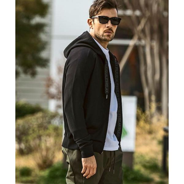 1PIU1UGUALE3 RELAX パイピングロゴワイドスピンドルパーカー ブラック