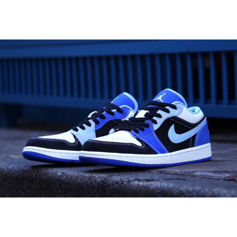 black and blue and white jordan 1