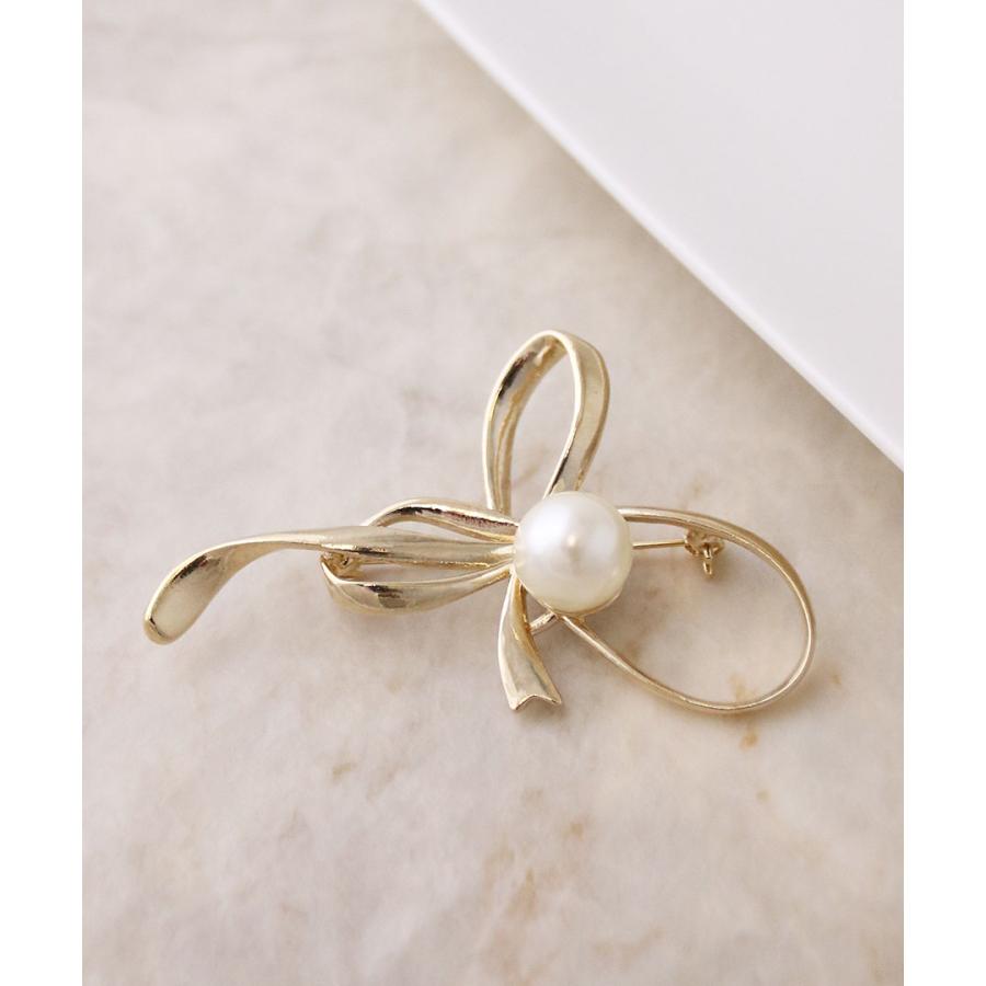 ヴァンテーヌ ブローチ リボン モチーフ パール メタル 曲線 上品