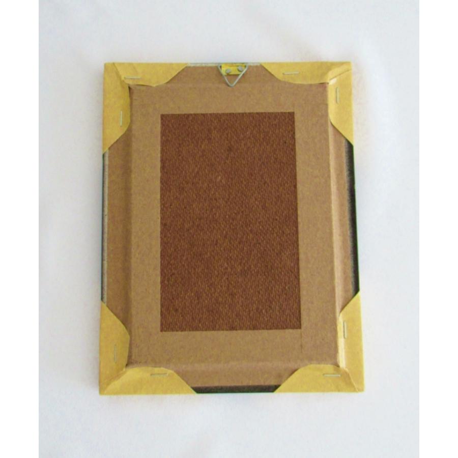 ペルーのお土産雑貨・額入りトゥミ・インテリア壁掛け・フック付き