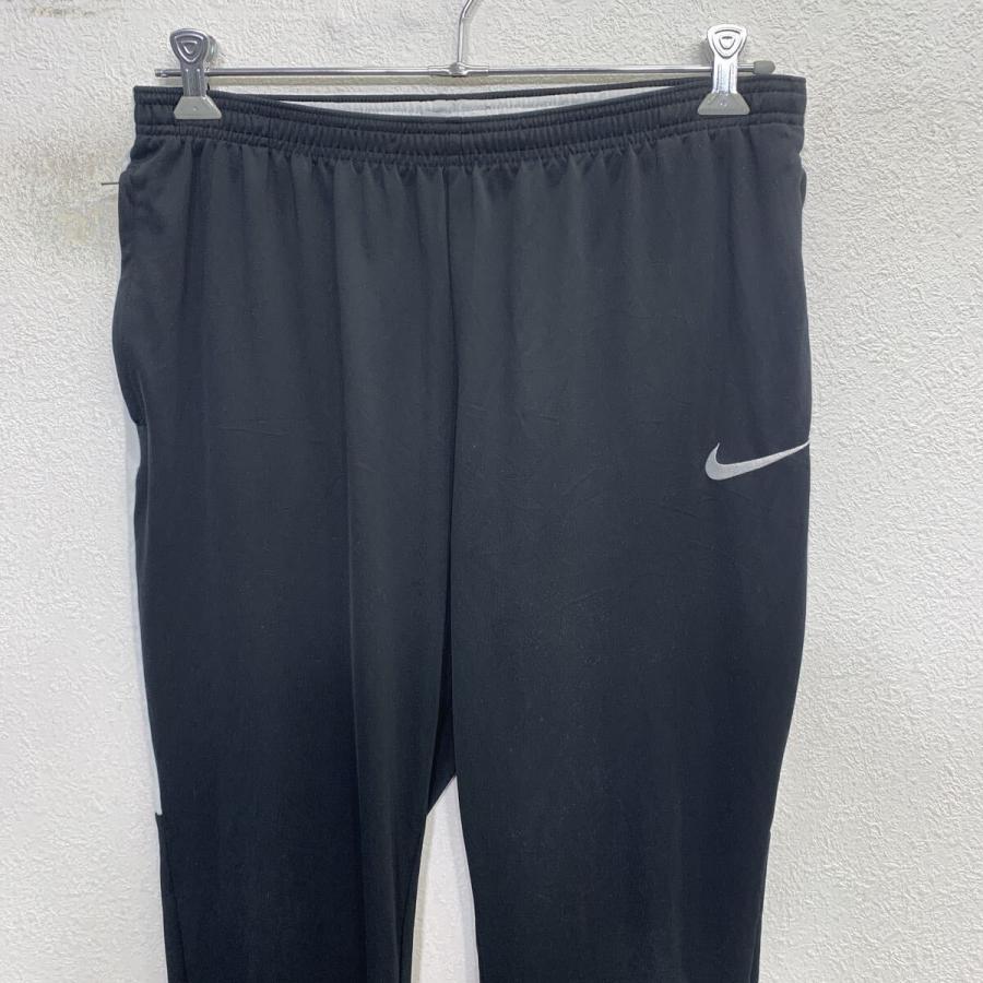 Nike ブラック ナイロンジャージ　パンツ　00's NIKE ジャージパンツ L ブラック ホワイト ナイキ イージーパンツ