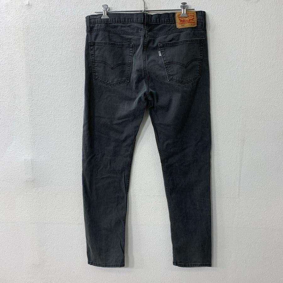 Levi's 502 デニムパンツ W36 L36 日本製 Levi's 502 デニムパンツ ブラック W36 リーバイス ジップアップ 紙