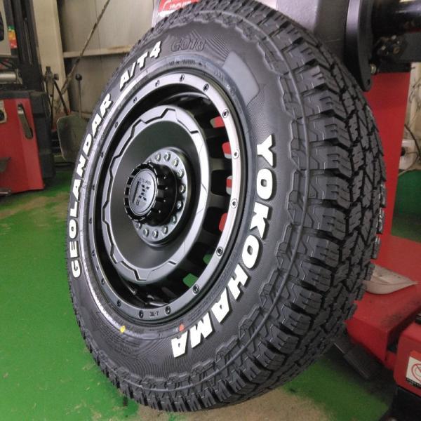 ジムニー JB23 JB64 タイヤホイール ヨコハマ ジオランダー A/T4 G018 185/85R16 ホワイトレター 16インチ SwaGGer 爆買の画像