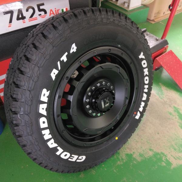 ジムニー JB23 JB64 タイヤホイール ヨコハマ ジオランダー A/T4 G018 185/85R16 ホワイトレター 16インチ SwaGGer 爆買の画像