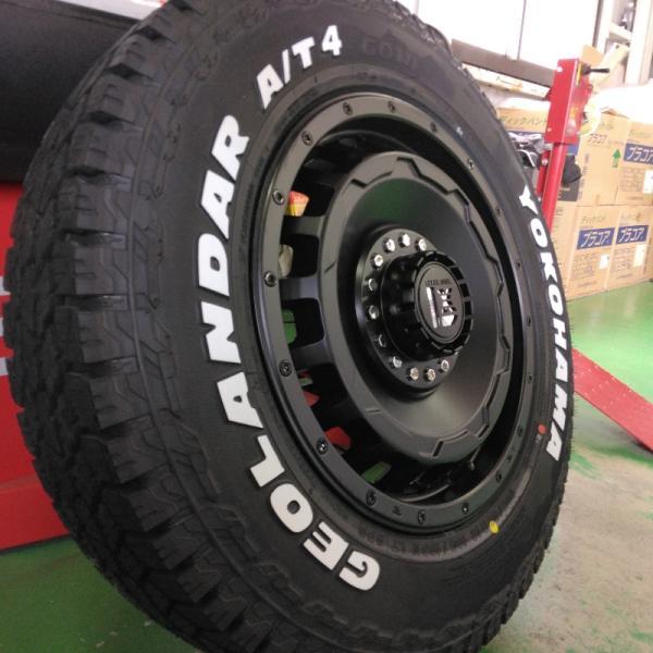 ジムニー JB23 JB64 タイヤホイール ヨコハマ ジオランダー A/T4 G018 185/85R16 ホワイトレター 16インチ SwaGGer 爆買の画像