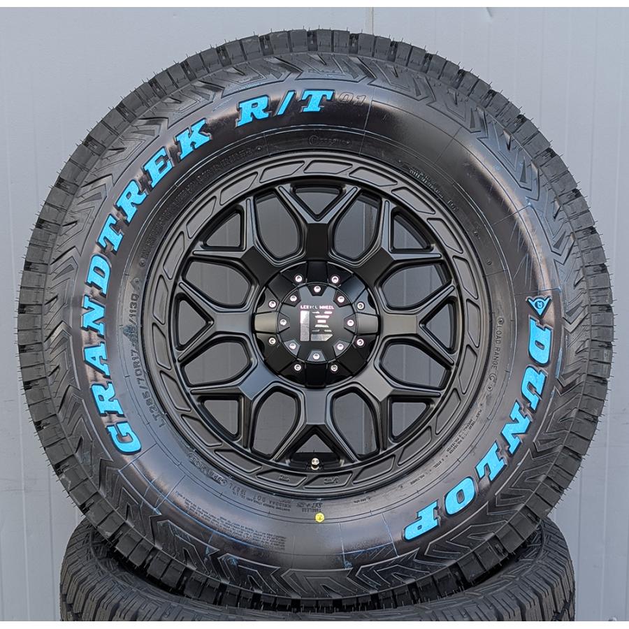 DUNLOP GRANDTREK AT23 265/65R18 18インチ 夏タイヤ 4本 23年製 バリ溝 ランクルプラド ランクル300 ランクル250等　(VTM222) DUNLOP（ダンロップ） GRANDTREK AT23 265/65R18 新車装着 OEMタイヤ 1