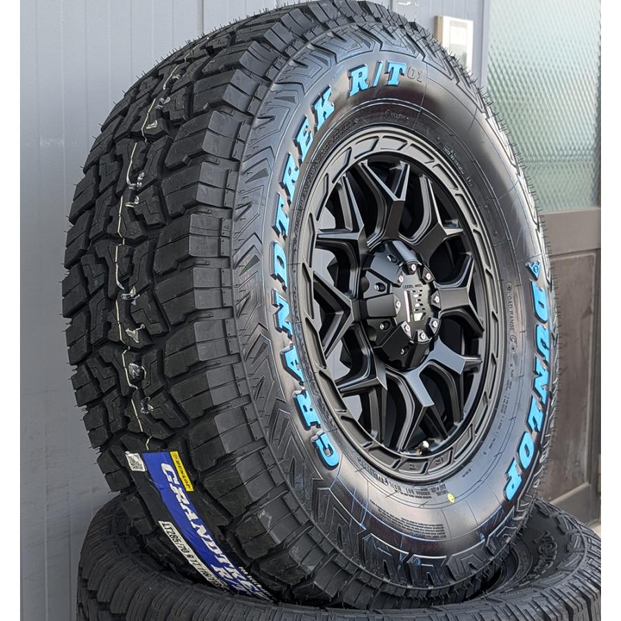 DUNLOP GRANDTREK AT23 265/65R18 18インチ 夏タイヤ 4本 23年製 バリ溝 ランクルプラド ランクル300 ランクル250等　(VTM222) DUNLOP（ダンロップ） GRANDTREK AT23 265/65R18 新車装着 OEMタイヤ 1