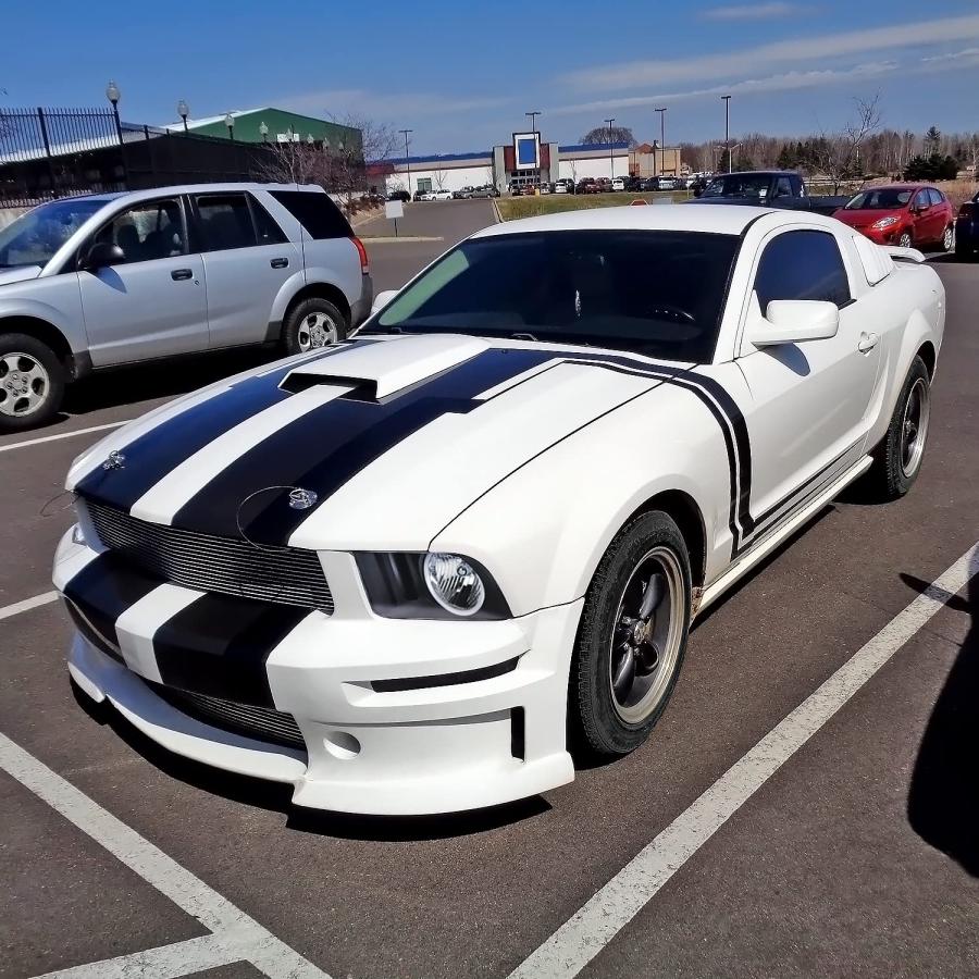 【並行輸入品】Spec D Tuning ブラックハウジング クリアレンズヘッドライト LEDヘイロー付き 2005 2009 Ford Musの画像