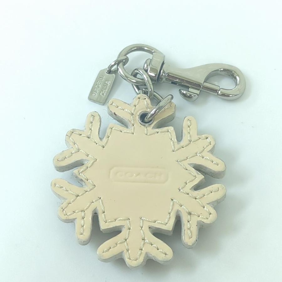 COACHコーチ 手帳型チャーム キーホルダー シグネチャー総柄 スノーフレーク COACH（コーチ） スノーフレーク モチーフ バッグチャーム