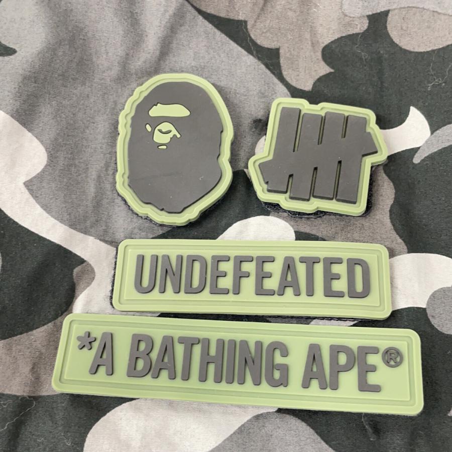 A BATHING APE アベイシングエイプ ×UNDEFEATED カモフラ M-51 モッズコート ブラック×グレー コート コットン メンズ 中古の画像
