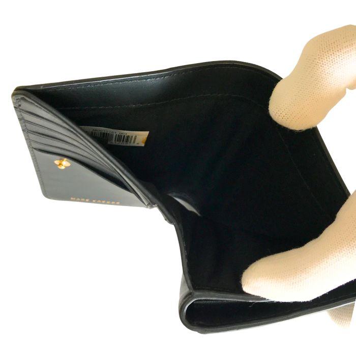 【ほぼ新品】MARCJACOBS 二つ折り財布　黒ゴールド MARC JACOBS 【中古】MARC マークジェイコブス 二つ折り 財布