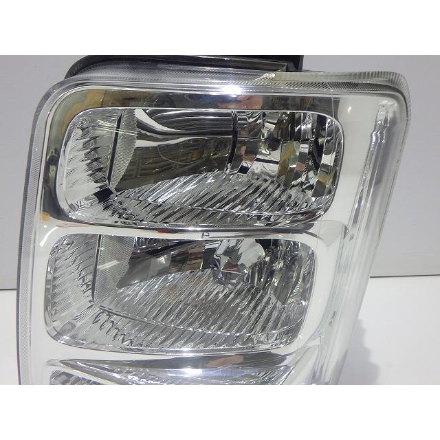スズキ（SUZUKI） エブリィ 左ヘッドライト HID LE06G6166 DA64W レベ