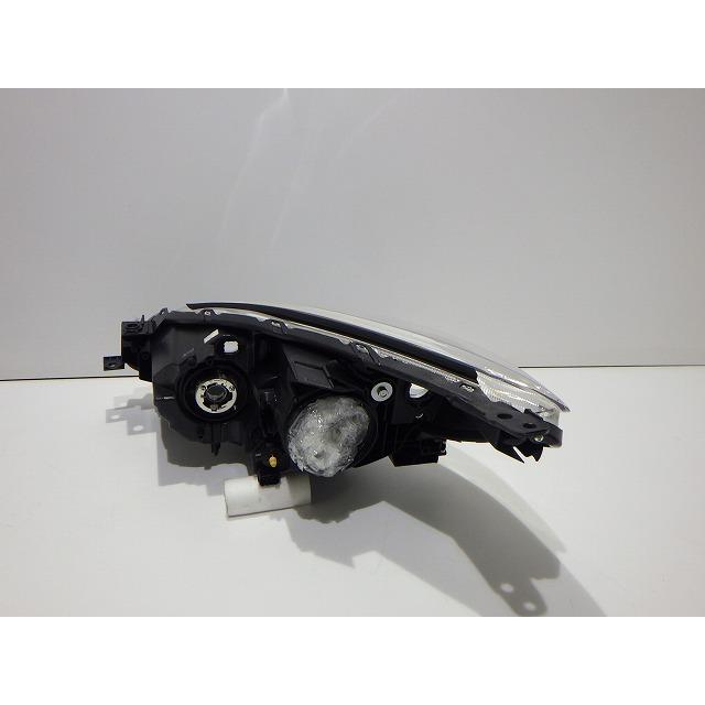 日産（NISSAN） プレマシー 右ヘッドライト HID CW ラフェスタ P9566 I