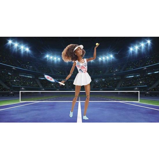 Barbie バービーロールモデルNaomi osaka Doll（11.5インチ、カーリーブルネットの髪）ポーズ可能、テニスドレス、靴とバイザーを着て、ラケット付き、子供向の画像