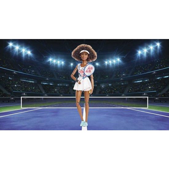 Barbie バービーロールモデルNaomi osaka Doll（11.5インチ、カーリーブルネットの髪）ポーズ可能、テニスドレス、靴とバイザーを着て、ラケット付き、子供向の画像