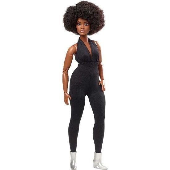 Barbie バービーの署名は、黒いジャンプスーツを着て、完全にポーズ可能なファッション人形に見える人形（曲線、ブルネット）