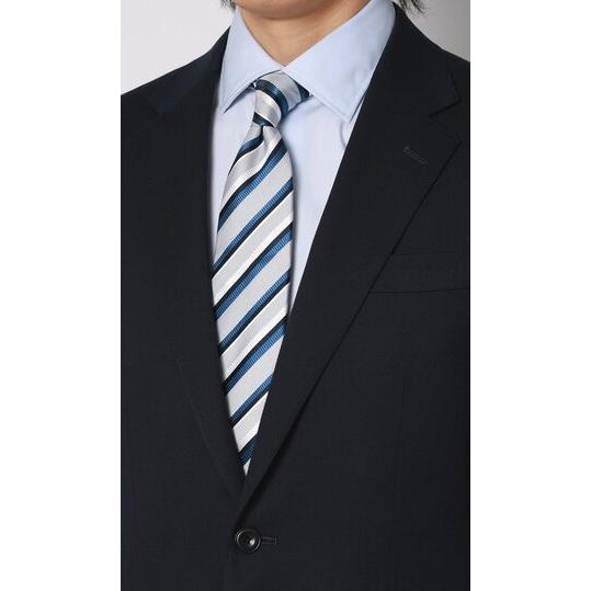 【洋服の青山】涼しい メンズ スーツ 春 夏 薄手 通気性 ウール混 ネイビー 無地 スリム スタイリッシュ 細身 2ボタン 背抜き ノータック メンズスーツの画像