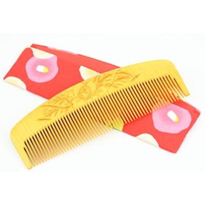 ふるさと納税 指宿市 [鹿児島県指定伝統的工芸品]薩摩つげ櫛(解櫛) 彫椿・手作り布ケースセット(053-1116)