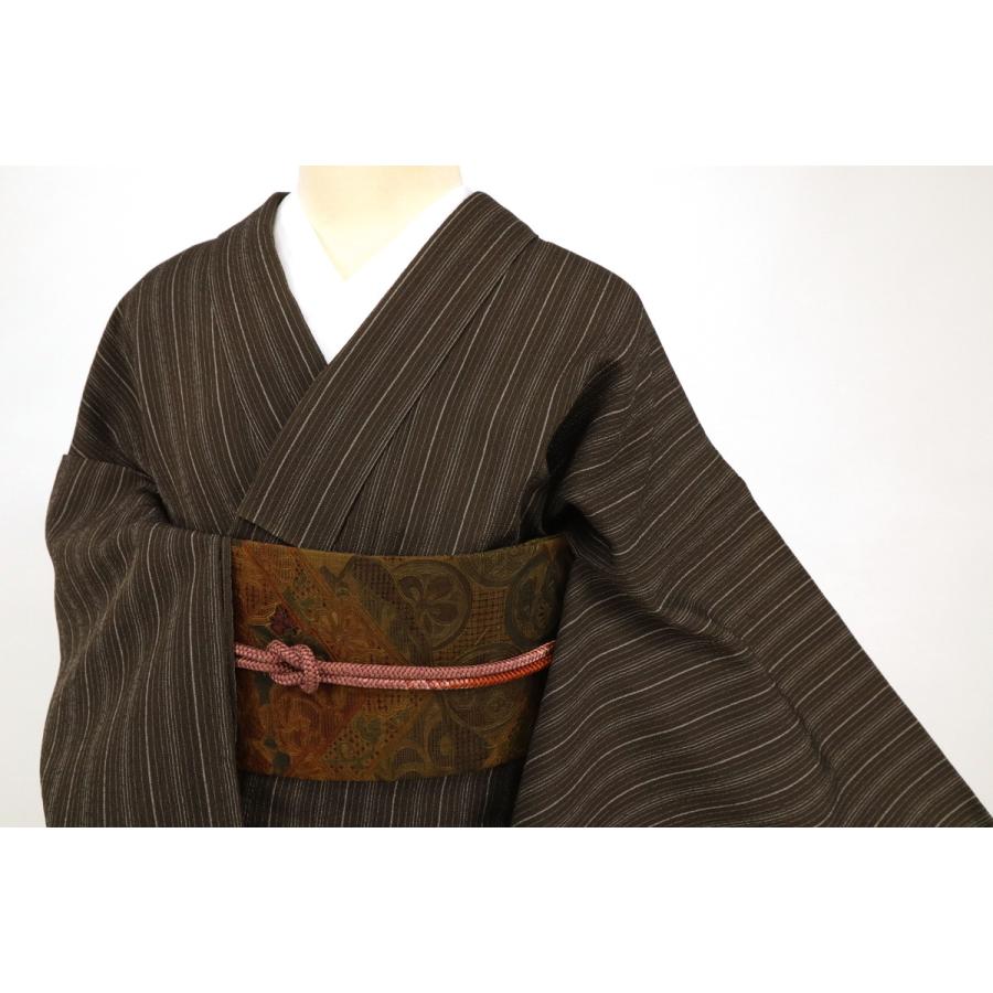 単衣紬地縞の絣裄67cm 正絹