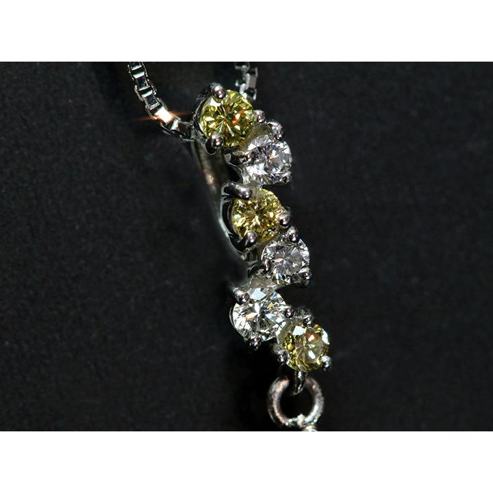 ブラウンとオレンジを感じる、イエローカラーダイヤモンド 0.303ct 