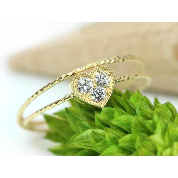 ダイヤモンド0.10ct ハートモチーフが煌めく 形状記憶ワイヤーでサイズ  