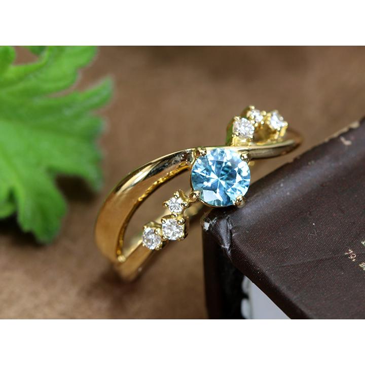 ブルージルコン 0.583ct 人気の稀少石 流れるデザイン K18YGゴールド 