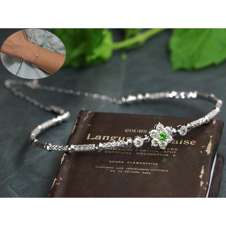 デマントイドガーネット0.05ct前後 無色ダイヤモンド取り巻き0.32ct  