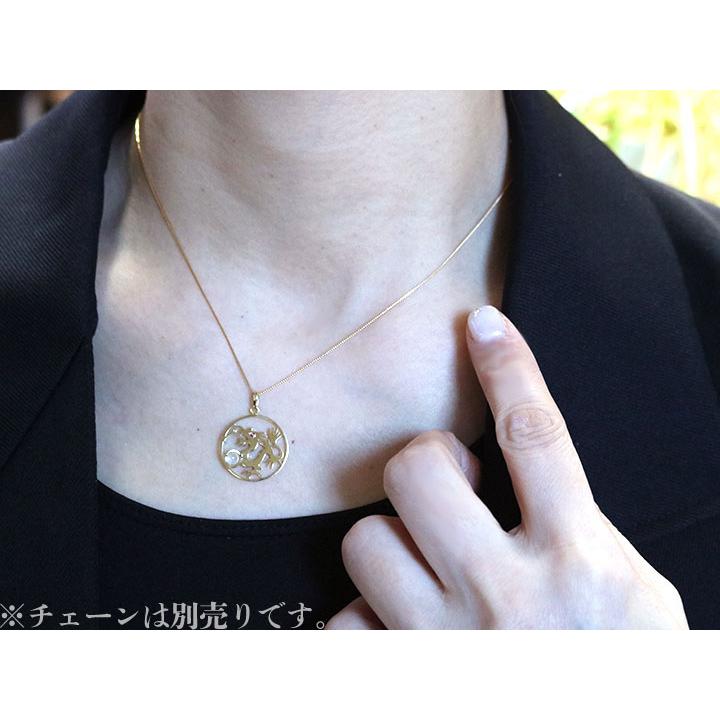 ギフト応援プライス  龍・ドラゴン・辰・縁起物 ルビー 0.008カラット 球体水晶（クォーツ） K18YG サークルデザインペンダントトップ 受注品の画像