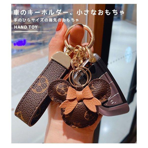 キーホルダー キーリング ミッキー ボタン ぬいぐるみボール 皮 小物 飾り 人気 可愛い かわいい バッグペンダント ロープ 女の子 :LDRY-0001:Leading 専門店 通販 キーホルダー キーリング スマートキー 猫 ネコ バッグチャーム かわいい 55