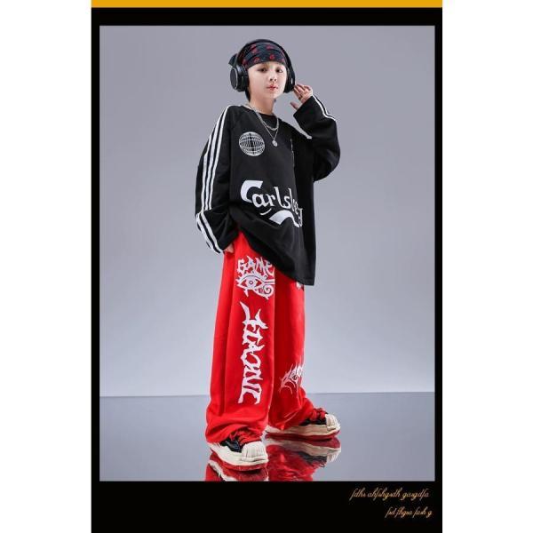 ヒップホップ 衣装 キッズダンス衣装 セットアップ 韓国 子供ダンス服 派手 白 黒 赤 K-POP hiphop 長袖Tシャツ スウェットパンツの画像