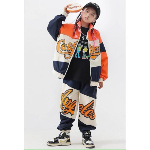 ガールズヒップホップ ダンス衣装 キッズ セットアップ 派手 へそ出しトップス ショートパンツ シースルー K-POP 韓国 オレンジ 黒 フラッグチェックの画像