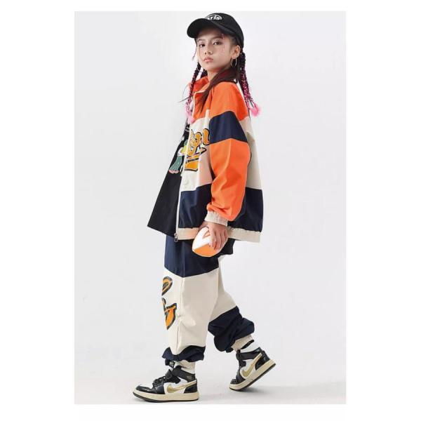 ガールズヒップホップ ダンス衣装 キッズ セットアップ 派手 へそ出しトップス ショートパンツ シースルー K-POP 韓国 オレンジ 黒 フラッグチェックの画像