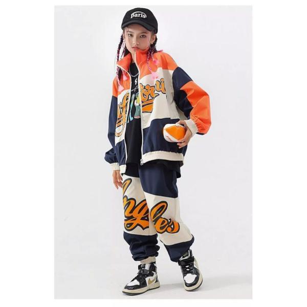 ガールズヒップホップ ダンス衣装 キッズ セットアップ 派手 へそ出しトップス ショートパンツ シースルー K-POP 韓国 オレンジ 黒 フラッグチェックの画像