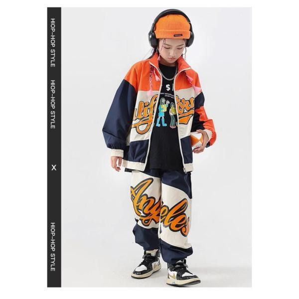 ガールズヒップホップ ダンス衣装 キッズ セットアップ 派手 へそ出しトップス ショートパンツ シースルー K-POP 韓国 オレンジ 黒 フラッグチェックの画像