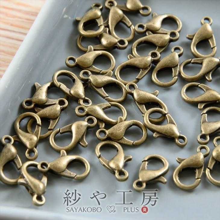 カニカン アンティークゴールド 12mm×7mm 約30個 30ヶ 留め具 フック ナスカン アクセサリーパーツ パーツ :ap000337:紗や工房 Yahoo!店 - 通販 - Yahoo!ショッピング カニカン アンティークゴールド 12mm×7mm 約30個 30ヶ 留め具 フック ナスカン アクセサリーパーツ パーツ :ap000337:紗や工房 Yahoo!店 - 通販 - Yahoo!ショッピング