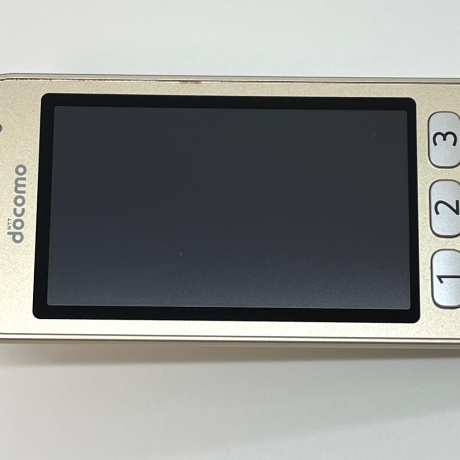 らくらくホン F-02J ドコモ SIMロック解除済 4G対応 ゴールド 白ロム