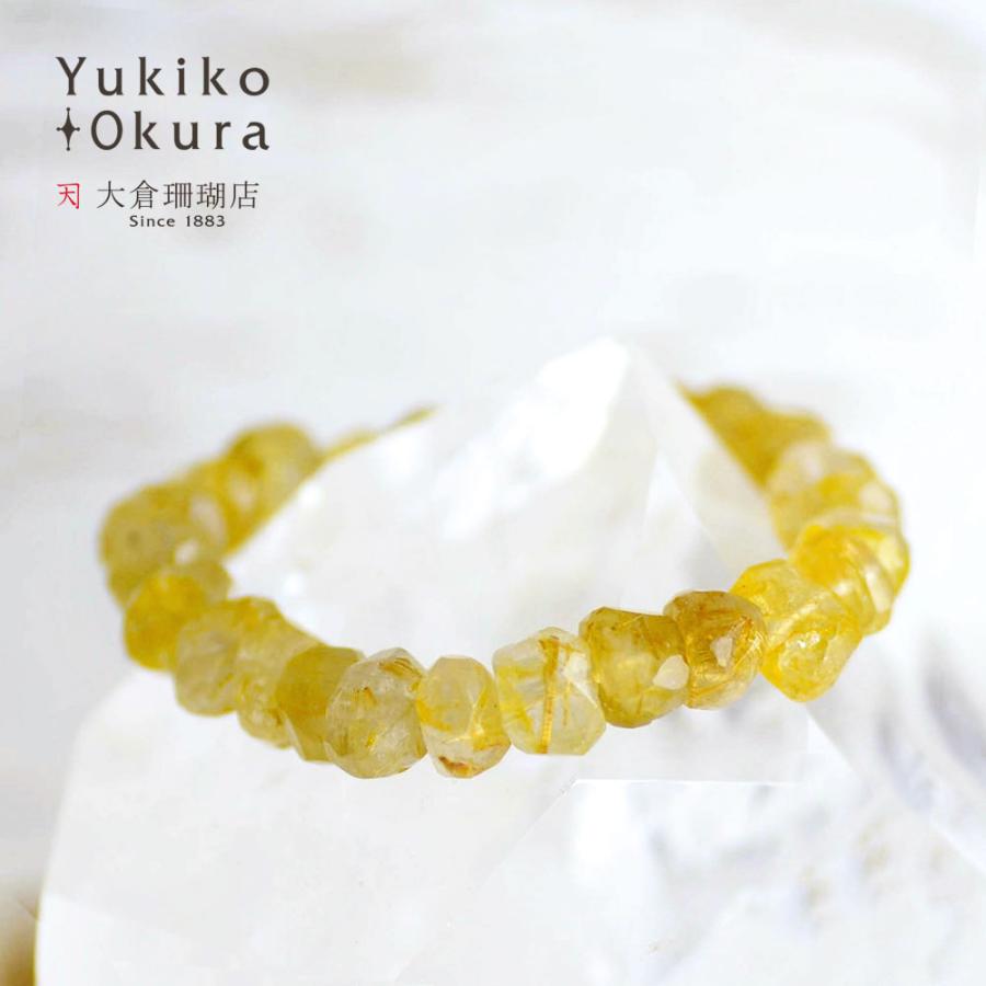 ルチルクォーツ タンブル平カット ゴムブレスレット