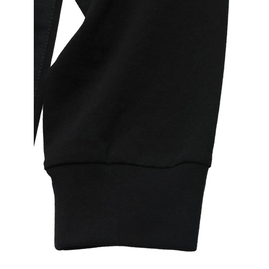 sacai（サカイ） ロンT メンズ コラボ sacai×Carhartt WIP ロゴ